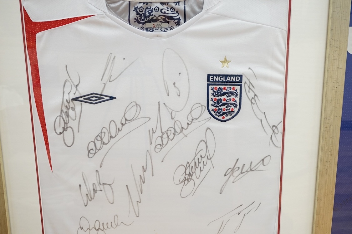 Three signed football shirts, to include England World Cup 2006 and Didier Drogba signed replica CFC shirt, framed. Condition - good